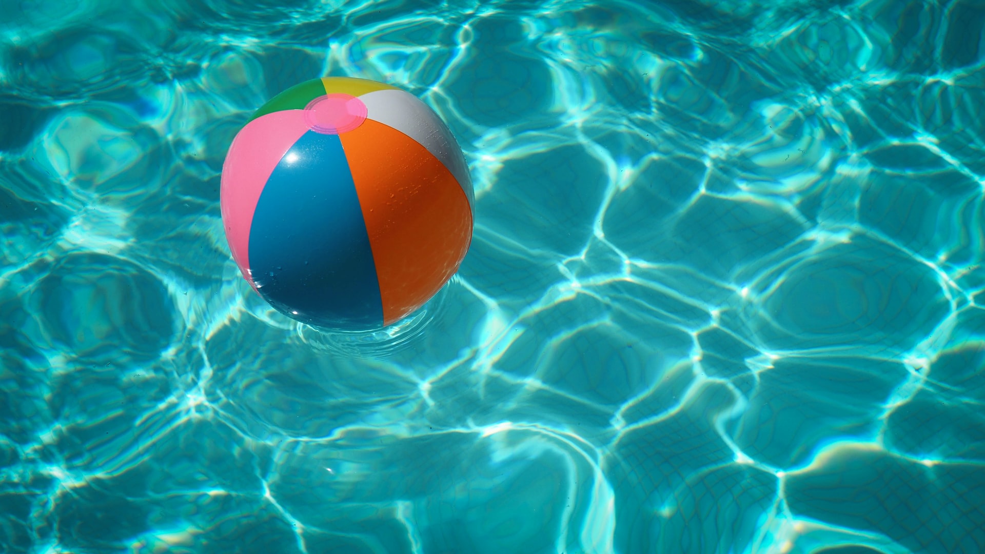 mold in pool -- swimming pool with inflatable ball floating in it